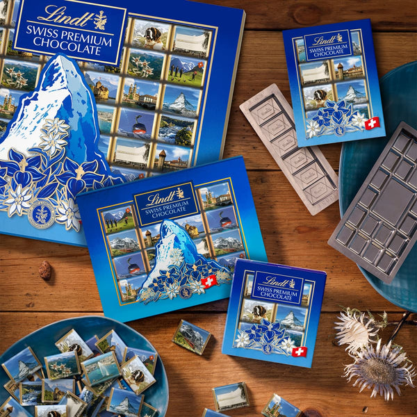 Lindt Schweizer Ansichten SOUVENIR 278g Napolitains 49 Mini Täfelchen Vollmilch in der Geschenkverpackung